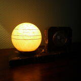 Table lamp with pendulum