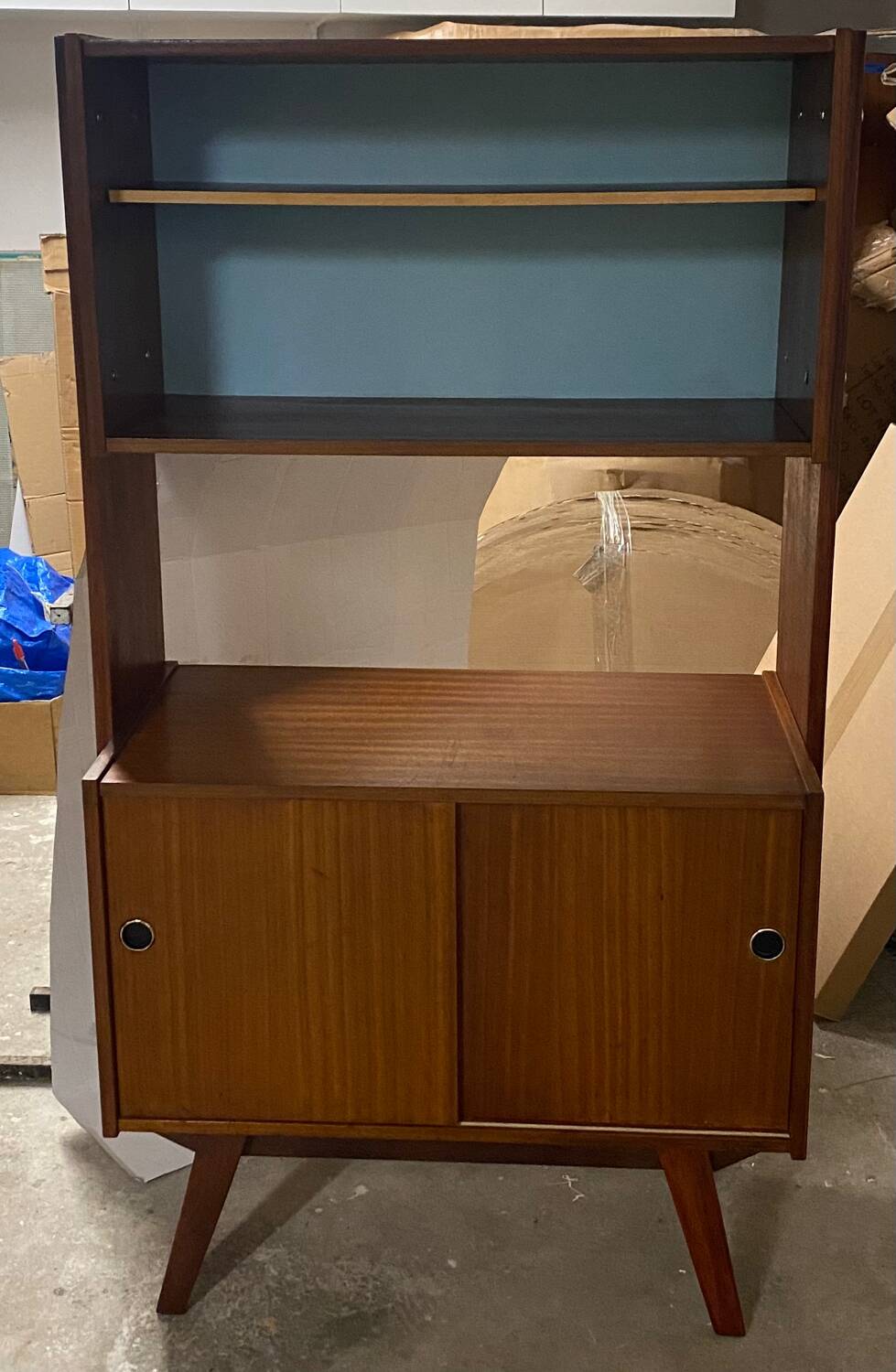 Vintage bookcase with compass feet from the 60s