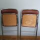 Souvignet folding chair, chrome metal and brown faux leather.