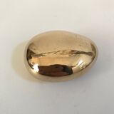 Bottle opener roller in gilded bronze by Monique Gerber