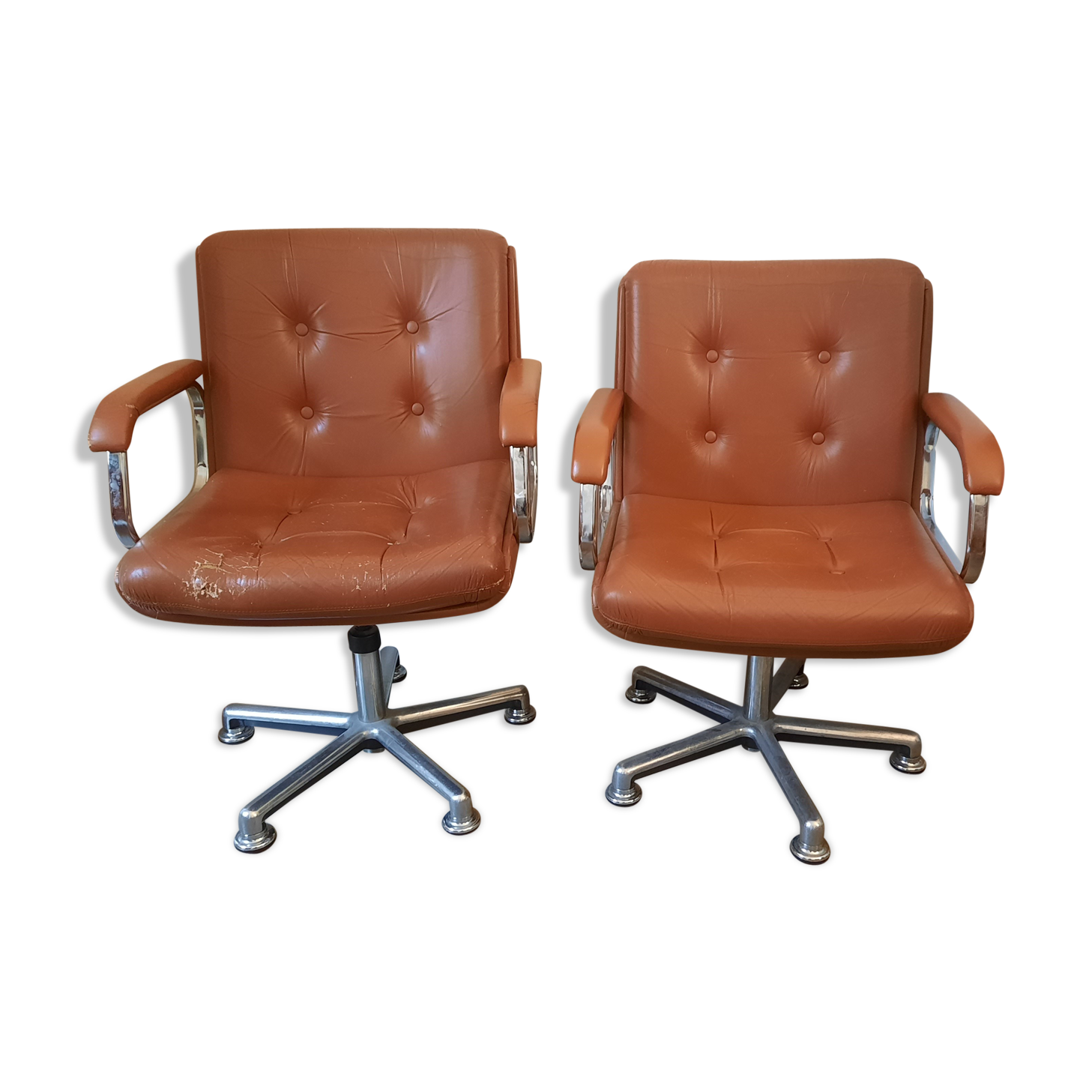 Brown leather armchairs