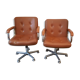 Fauteuils marron en cuir