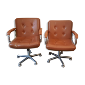 Brown leather armchairs