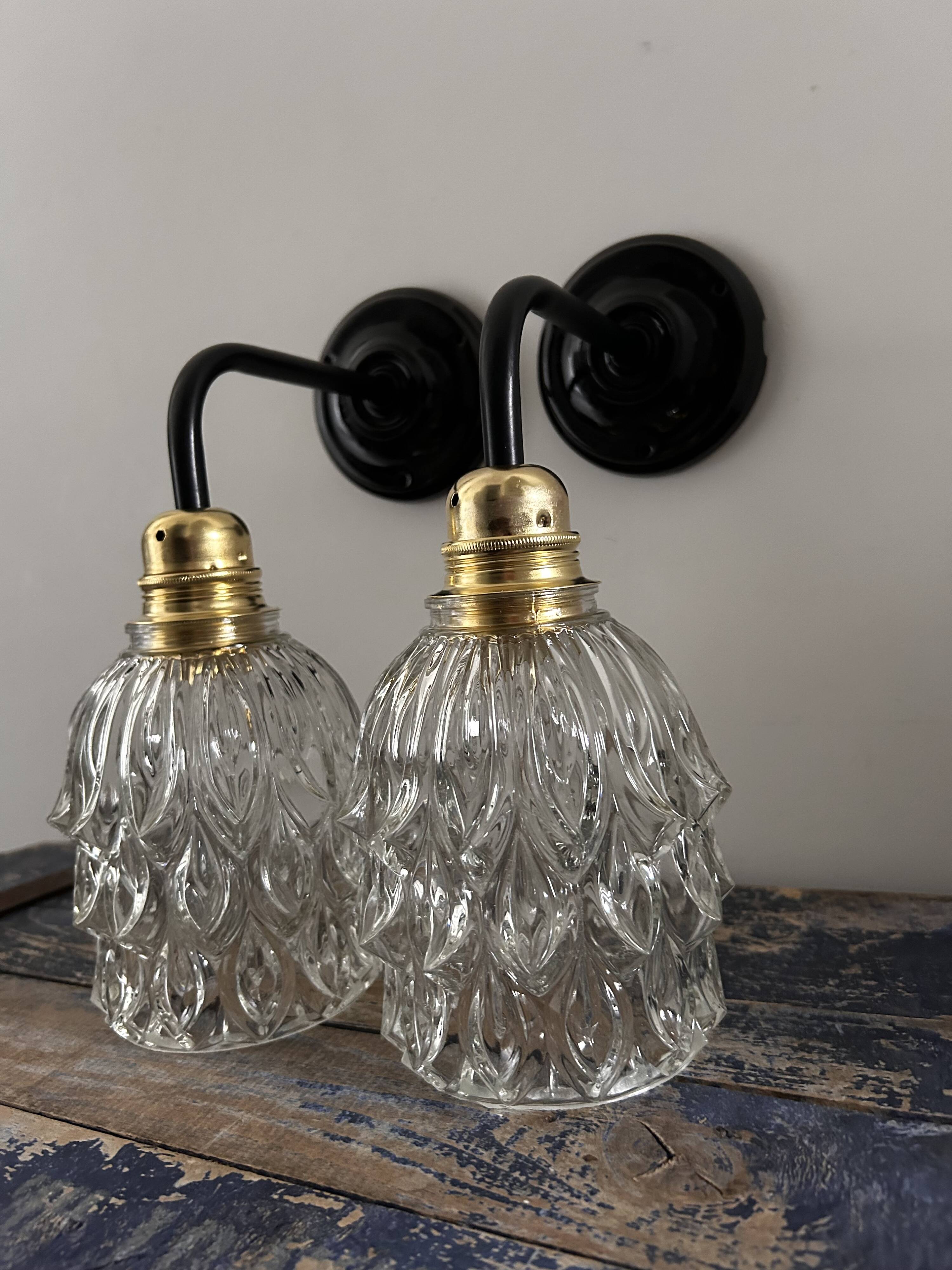 Pair of chiseled glass wall sconces