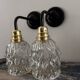 Pair of chiseled glass wall sconces