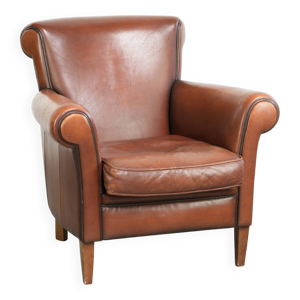 Fauteuil intemporel en - peau mouton