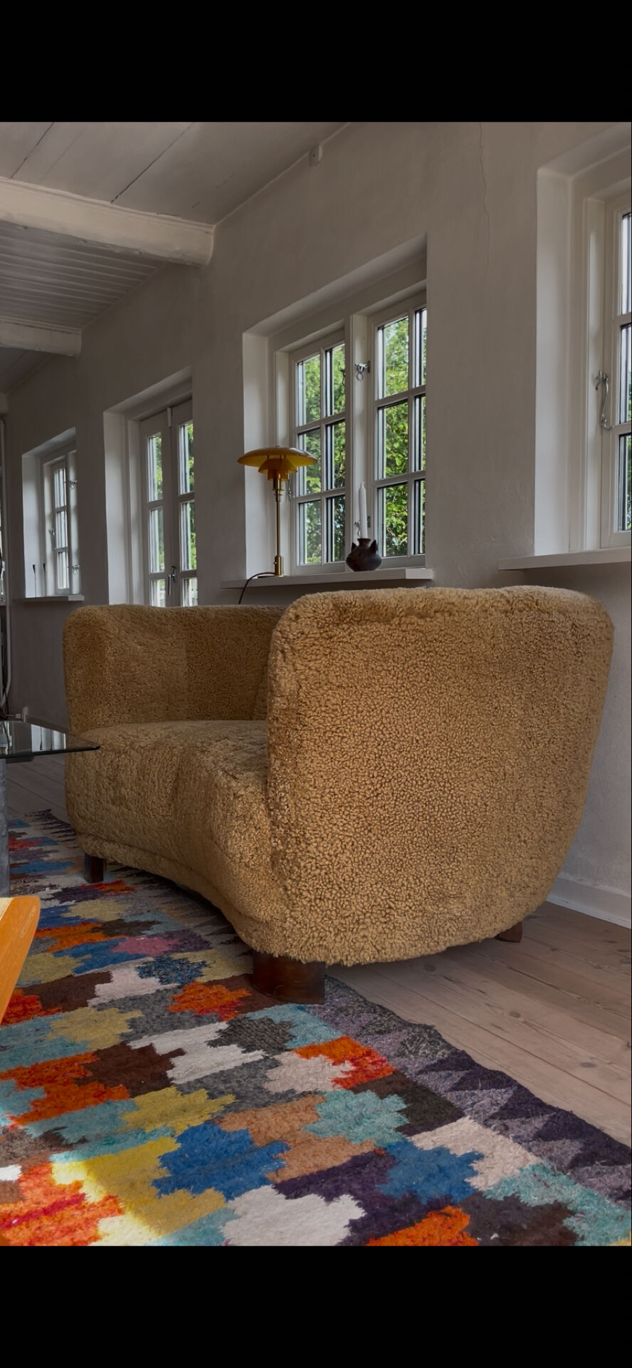 1950s banana sofa w/ lamb skin
