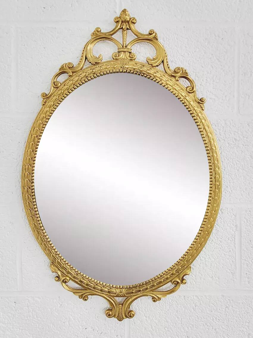 Miroir ovale ancien type médaillon sur cadre laiton