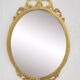 Miroir ovale ancien type médaillon sur cadre laiton