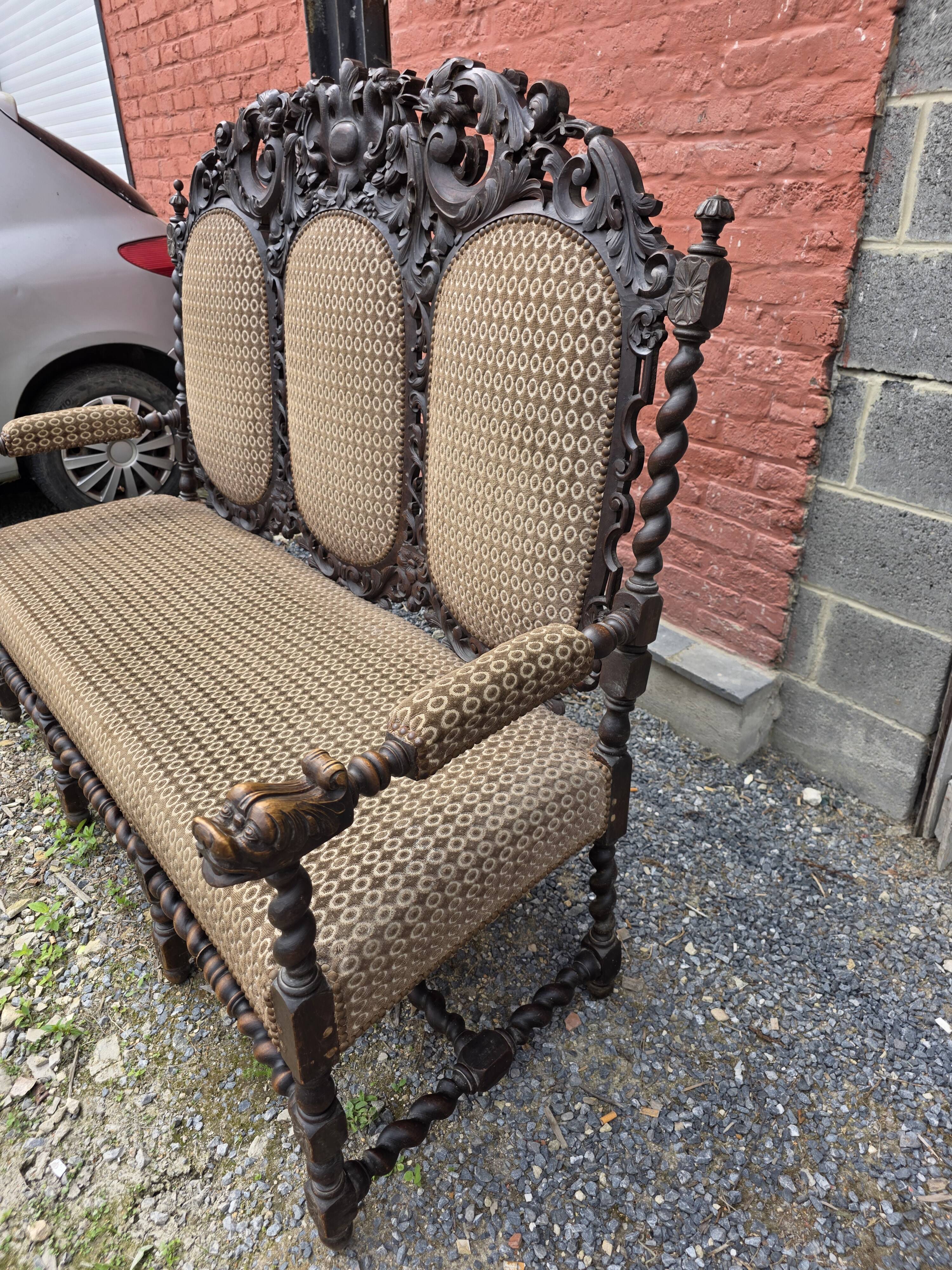 Three-seater armchair in Louis XIII style made of oak from the 19th century.
