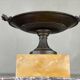 Bronze cup on a yellow Siena marble base, early 19th century.
