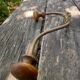 Wooden and metal wall coat rack.