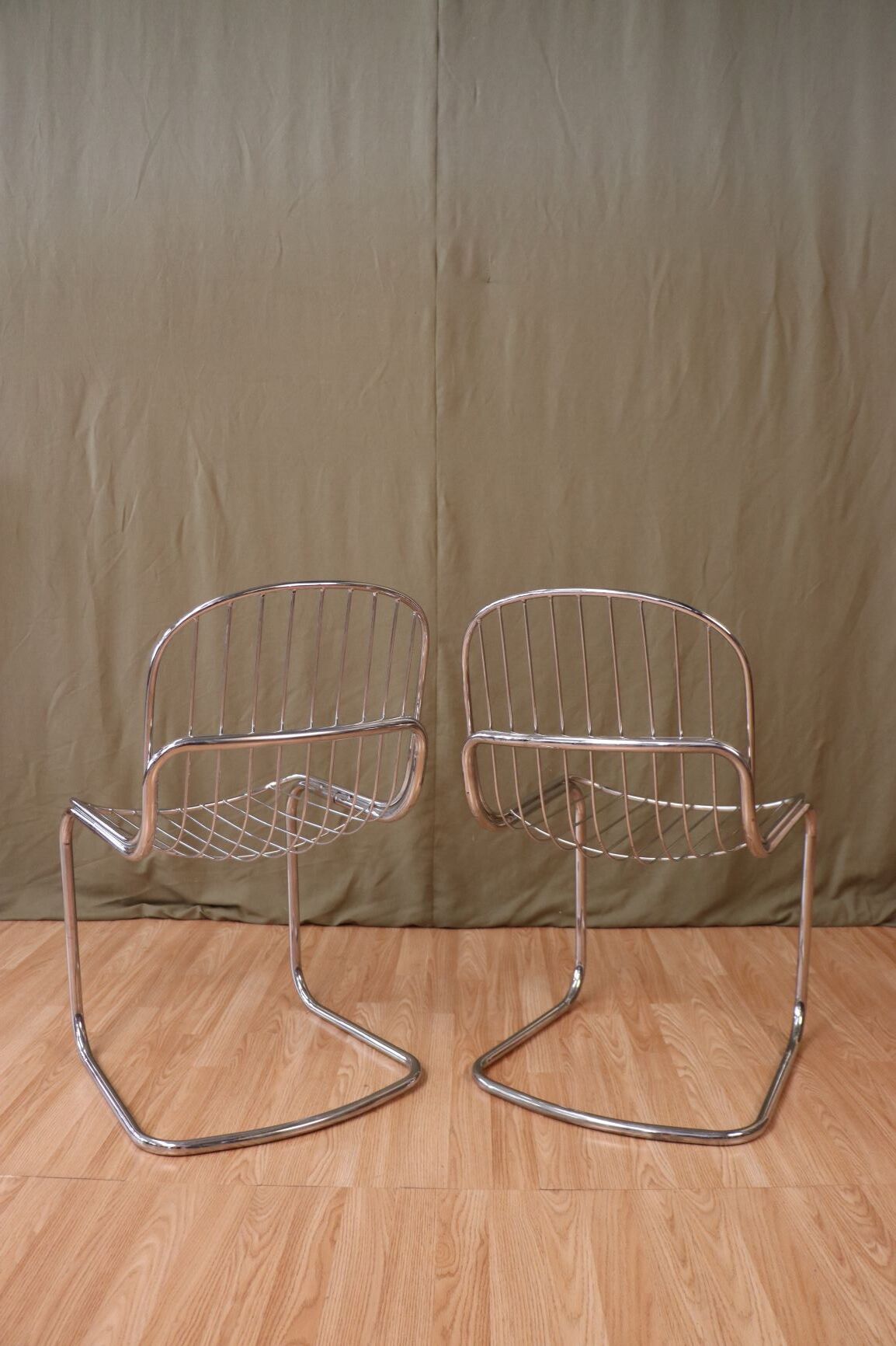 Series of 4 tubular steel chairs