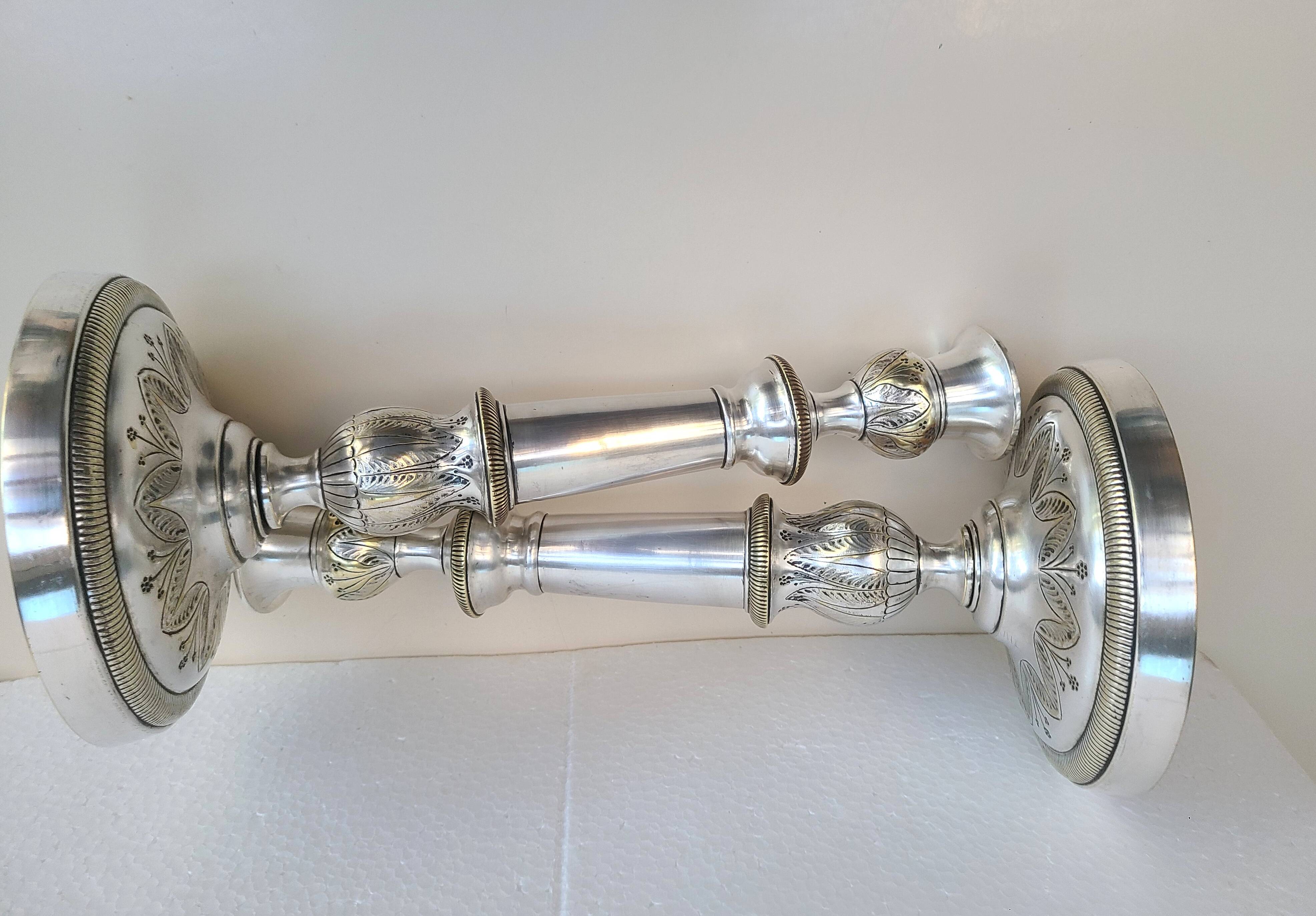 Antique silver-plated metal candlesticks