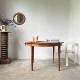 Scandinavian round teak table with extension