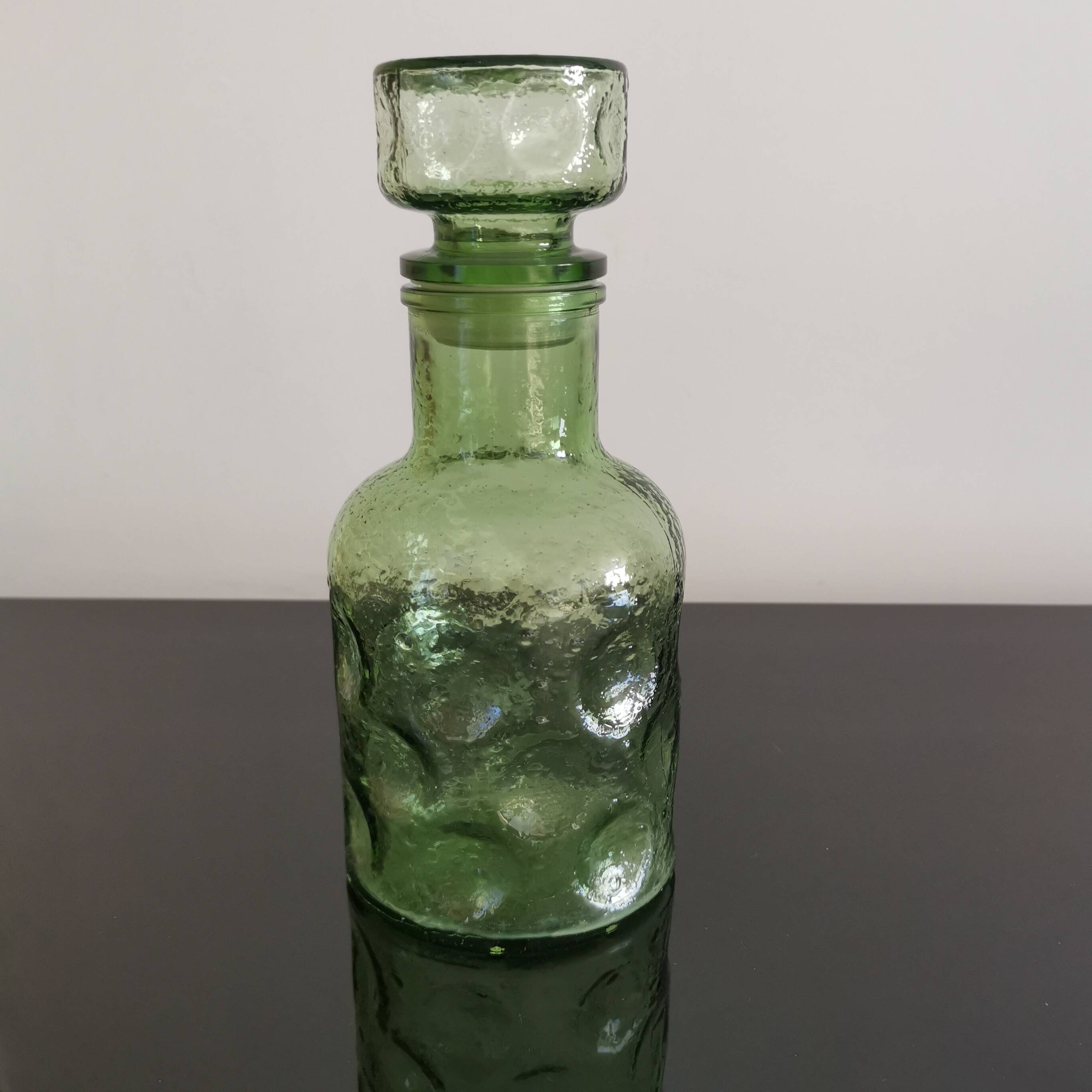 Old green glass carafe