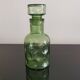 Old green glass carafe