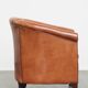English club chair in light cognac cowhide leather.