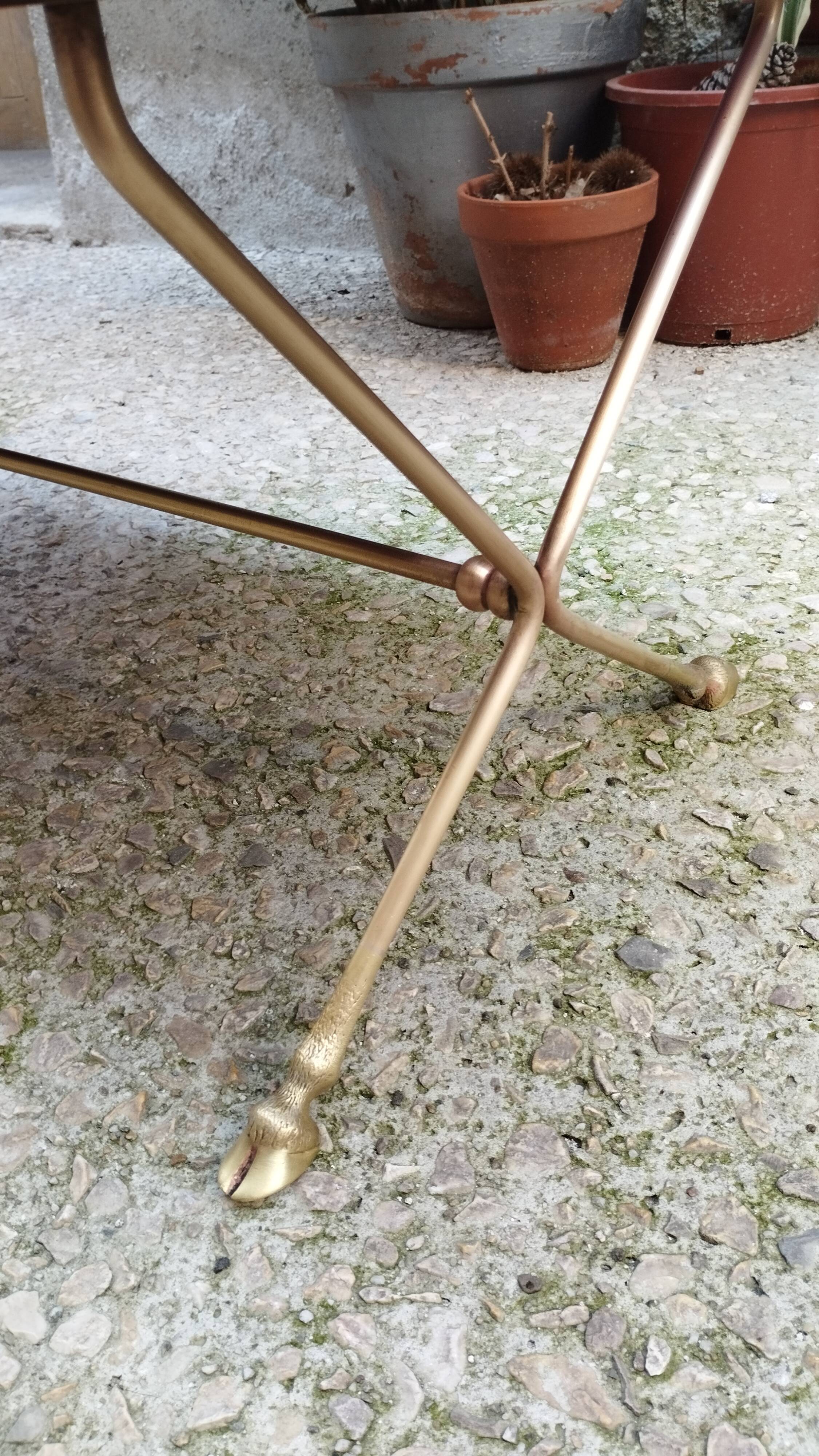 Rectangular coffee table in smoked glass and brass, animalist legs
