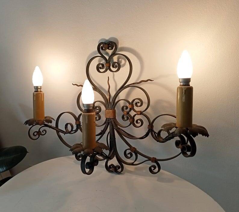 Antique wrought iron wall light from the 50s