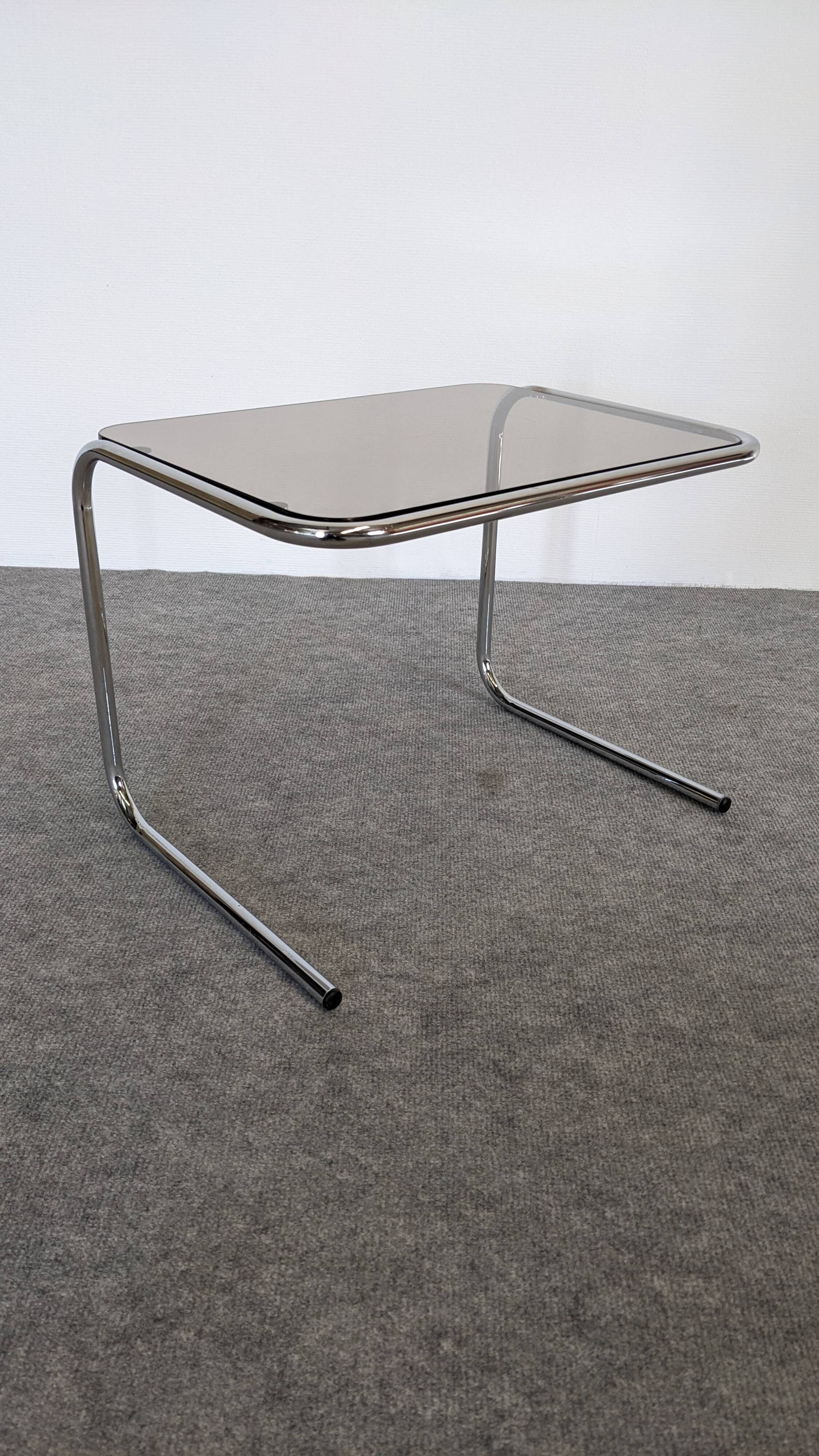 Nested tables with tubular chrome and smoked glass, France 1970.