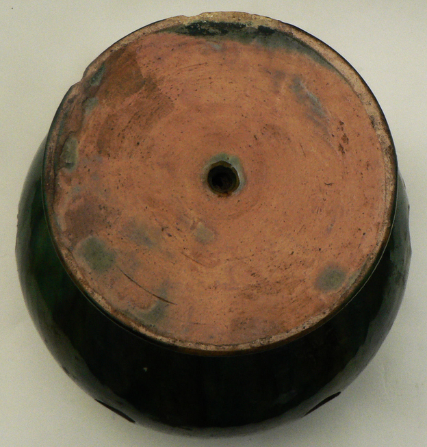 details on old bulb pot in glazed earthenware