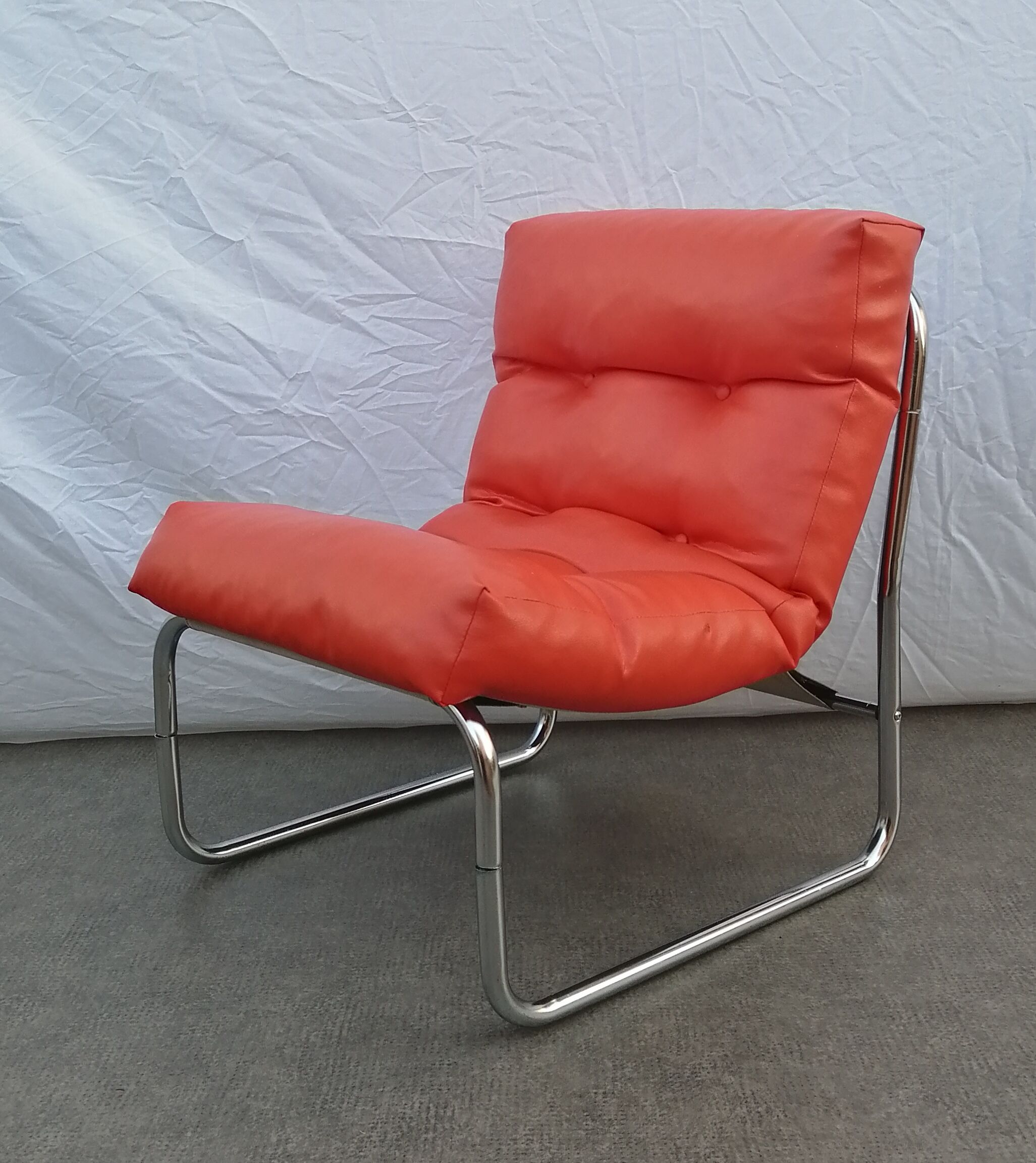 Orange pixi model armchair designed for Ikea by designer Gillis Lundgren 1970