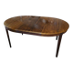 Scandinavian extendable table in rosewood from the 1960s, with 2 extensions.