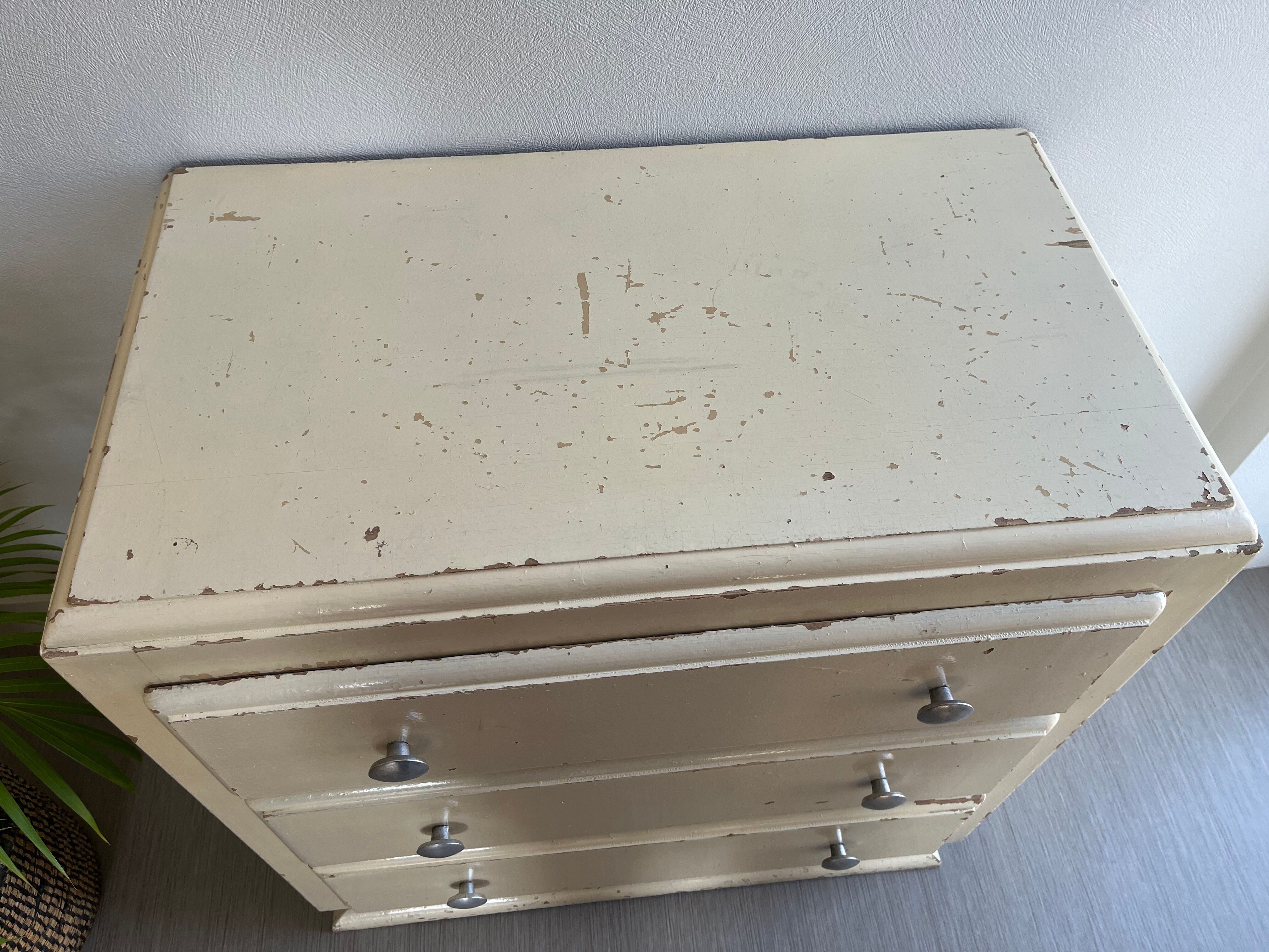 Vintage patinated wood chest of drawers