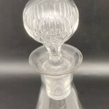 Glassware and bottle set in chiseled glass with flower motif