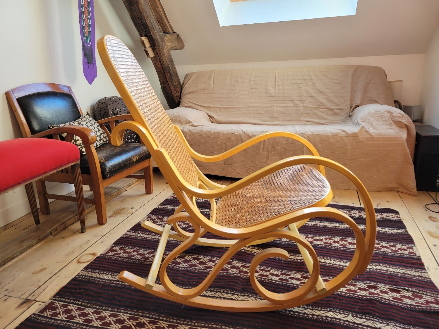 Rocking chair in arched wood and cane