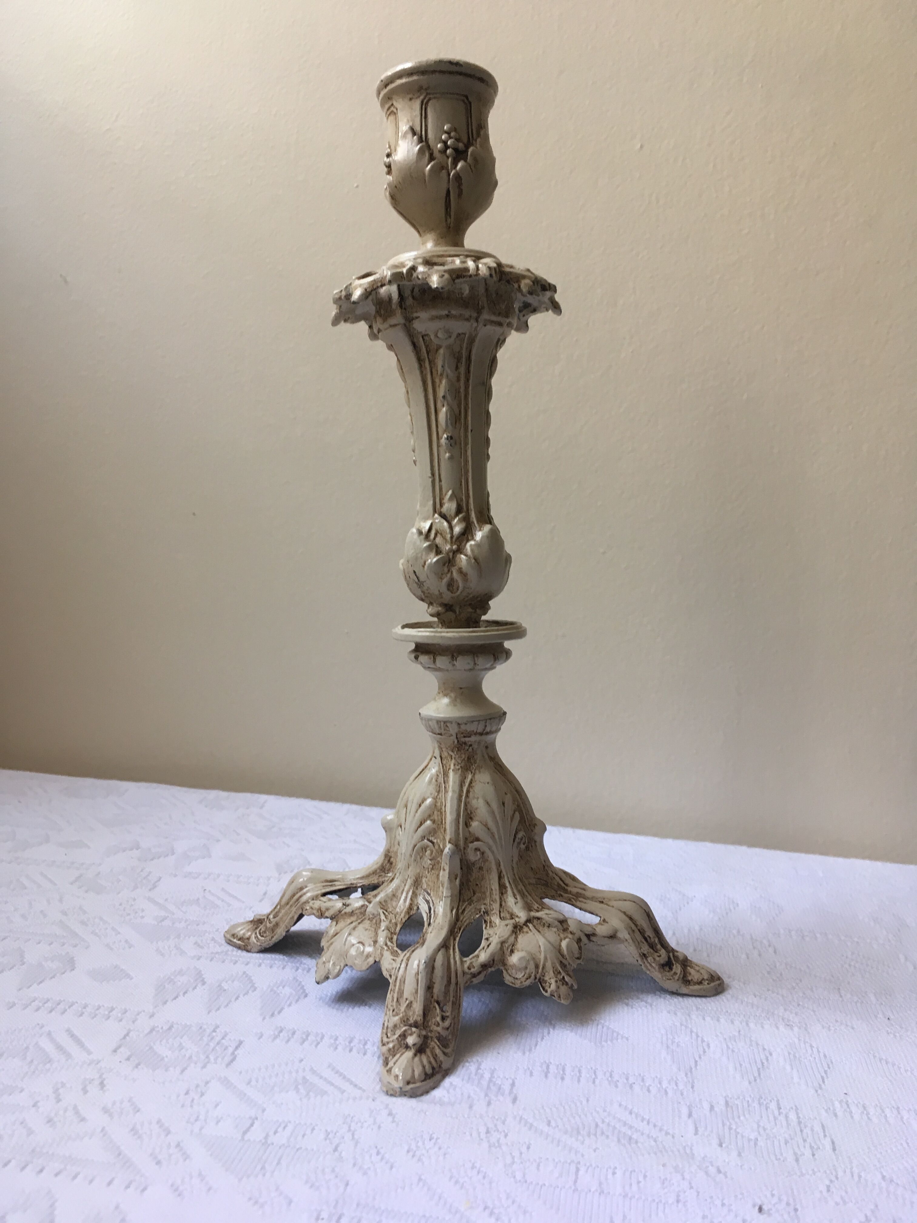 Large candle holder in patinated white painted metal