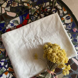 Large white cotton tea towel with damask thread.