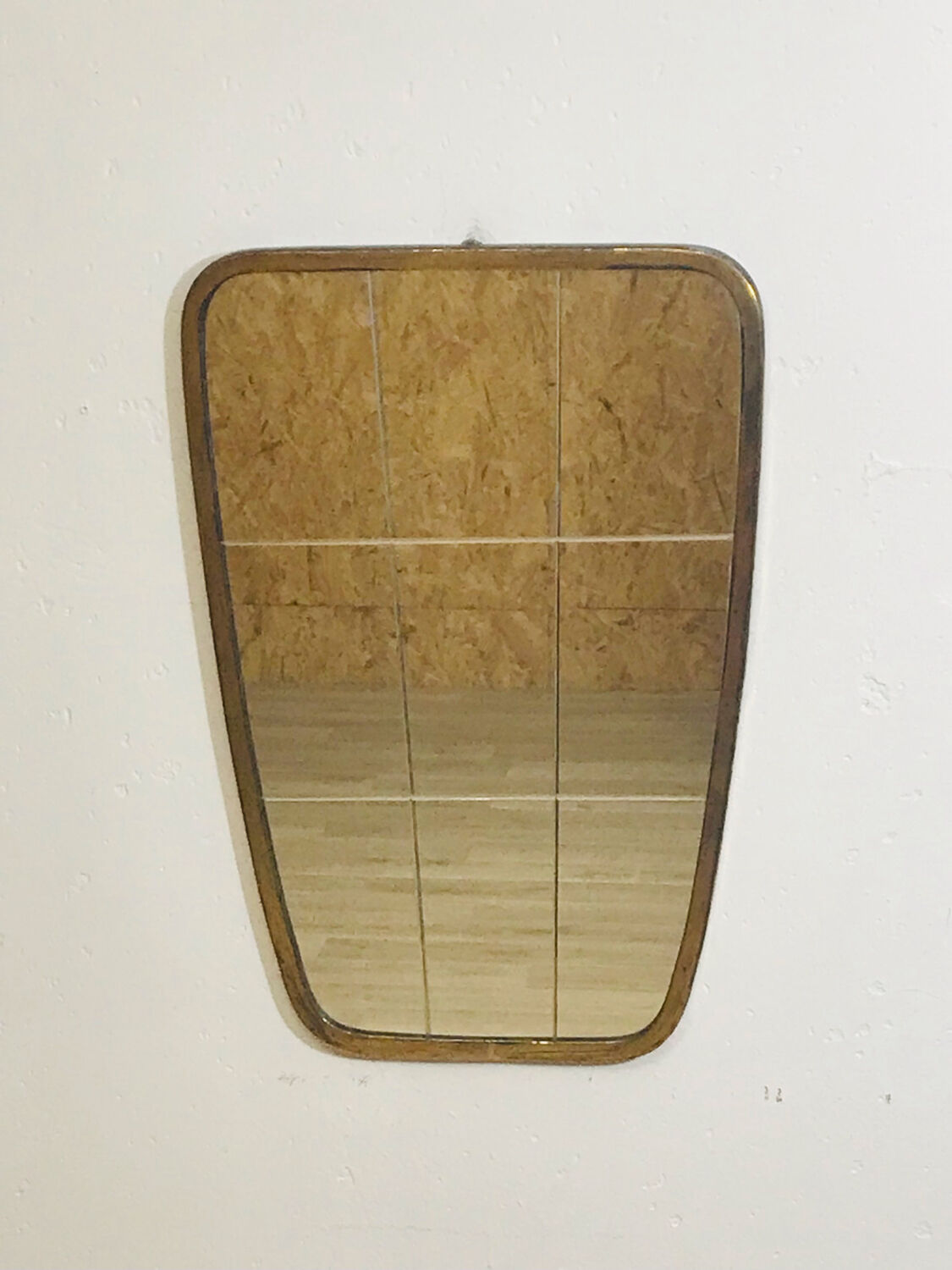 Asymmetrical mirror from the 60s