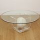 Vintage round coffee table in lucite and marbled glass.