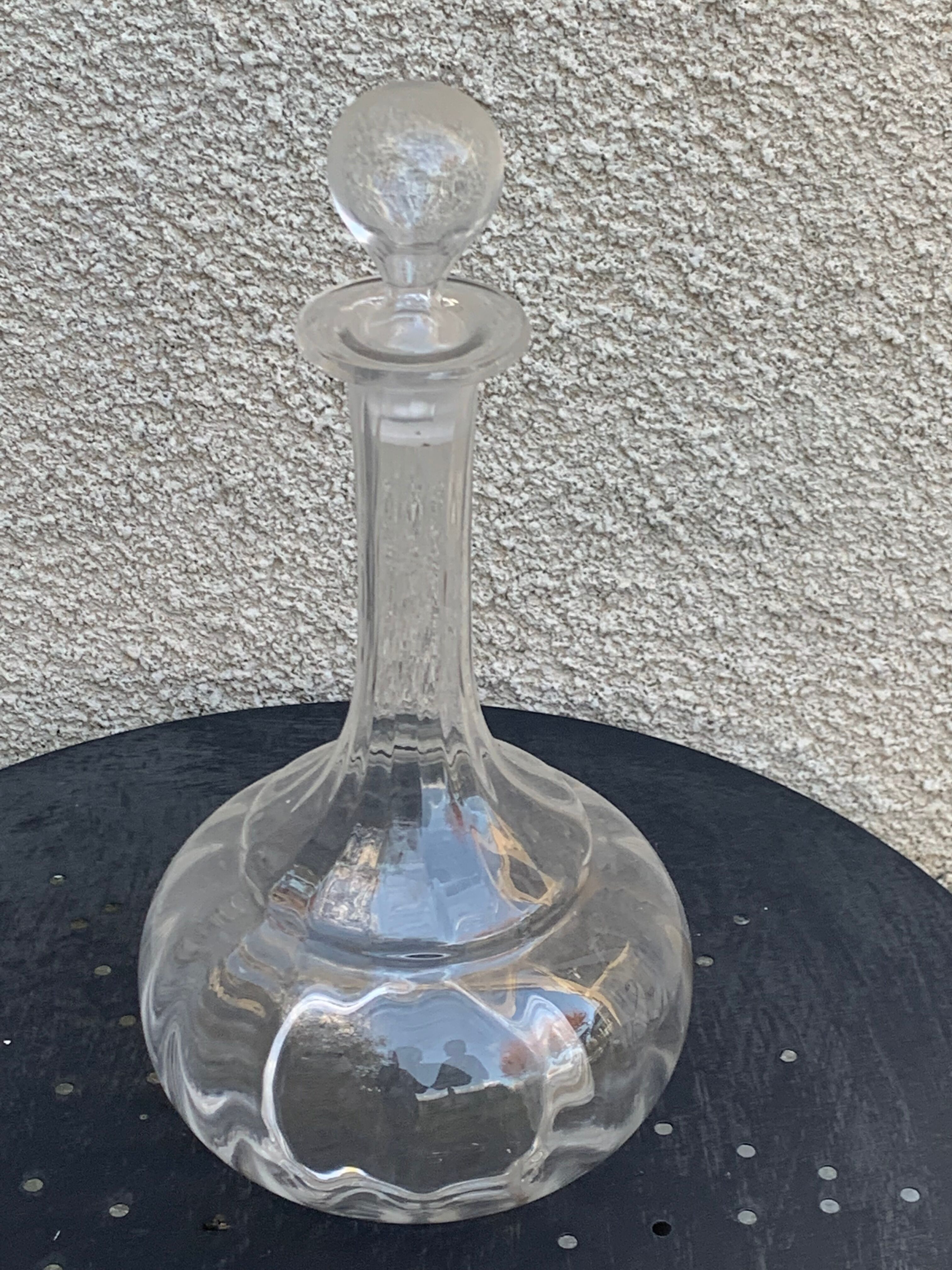 Elegant and vintage transparent glass wine decanter
