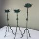 Sculptural candle holder trio