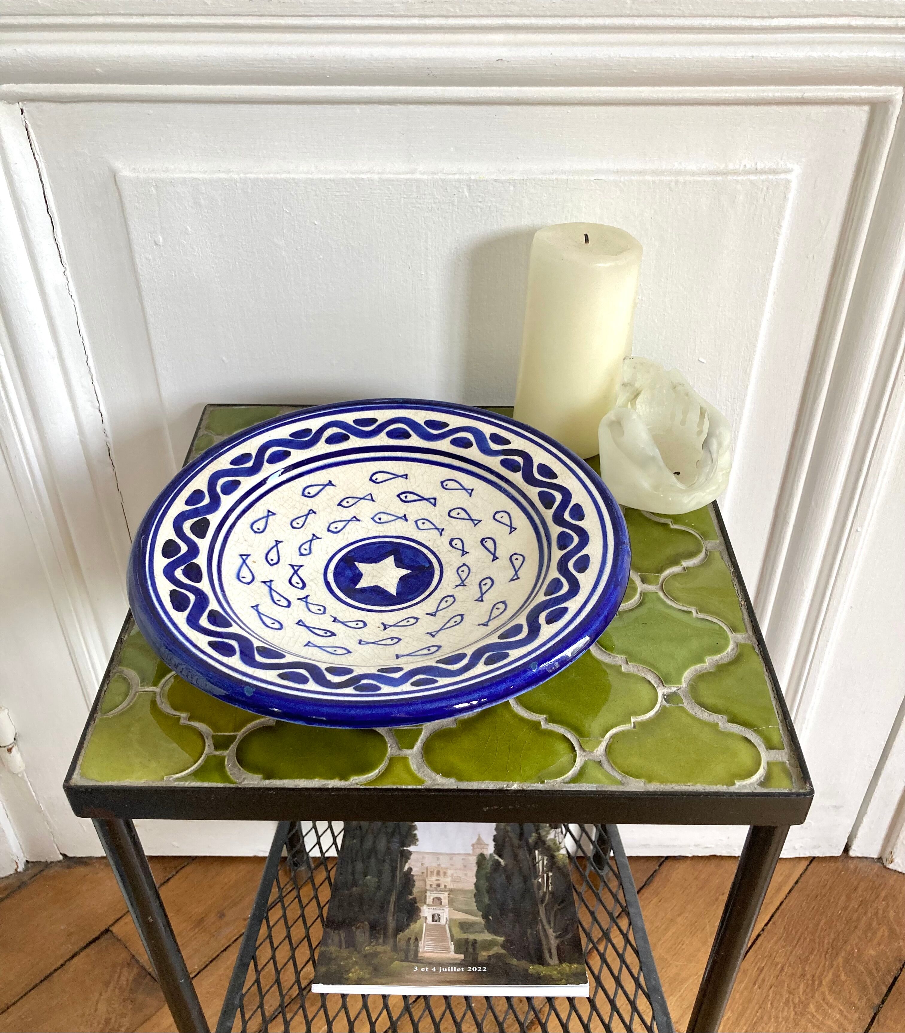 Decorative ceramic deep plate with fish decoration
