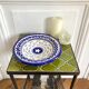 Decorative ceramic deep plate with fish decoration