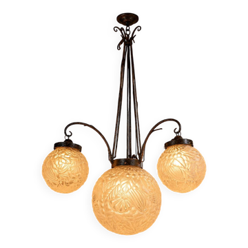 According to Muller: Art Deco chandelier with four lights.