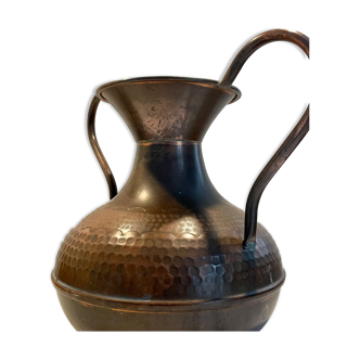 Old hammered copper water jug