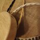 Large hanging pendant light with a burlap and pom-pom style