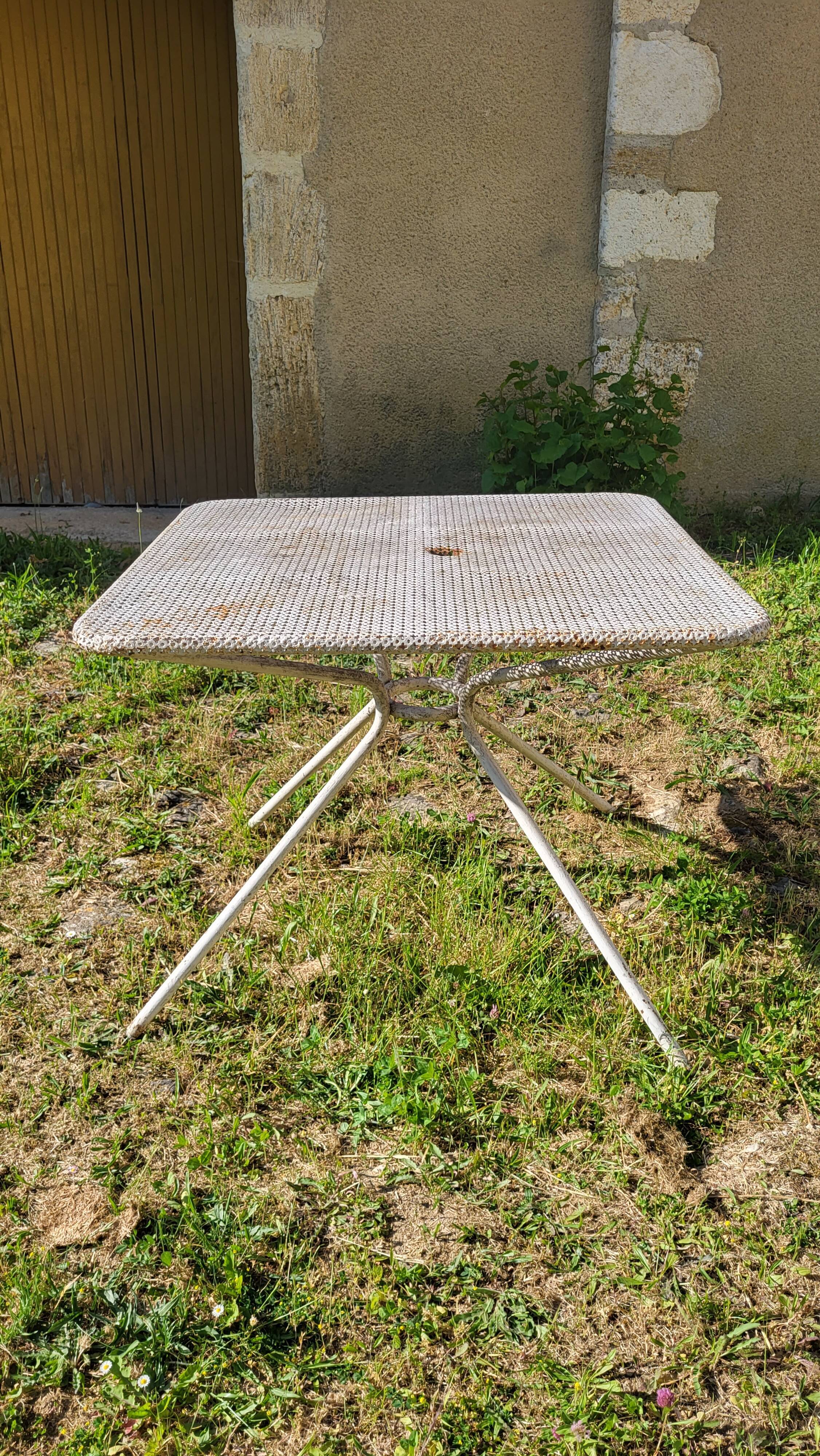 Perforated sheet metal garden table