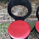 6 vintage Baumann seagull model chairs, black lacquered with red Skai seats.