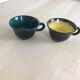 2 cup Keraluc Quimper set in green and yellow ceramic