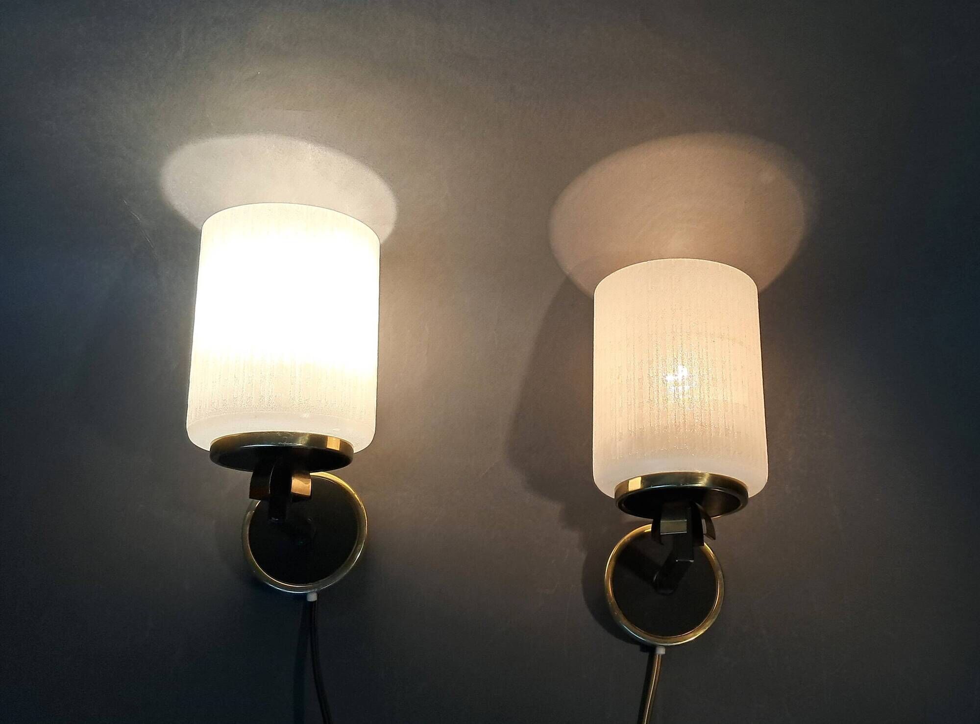Pair of wall lights in gilded brass, black metal and opaline, 1960