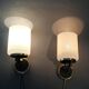 Pair of wall lights in gilded brass, black metal and opaline, 1960
