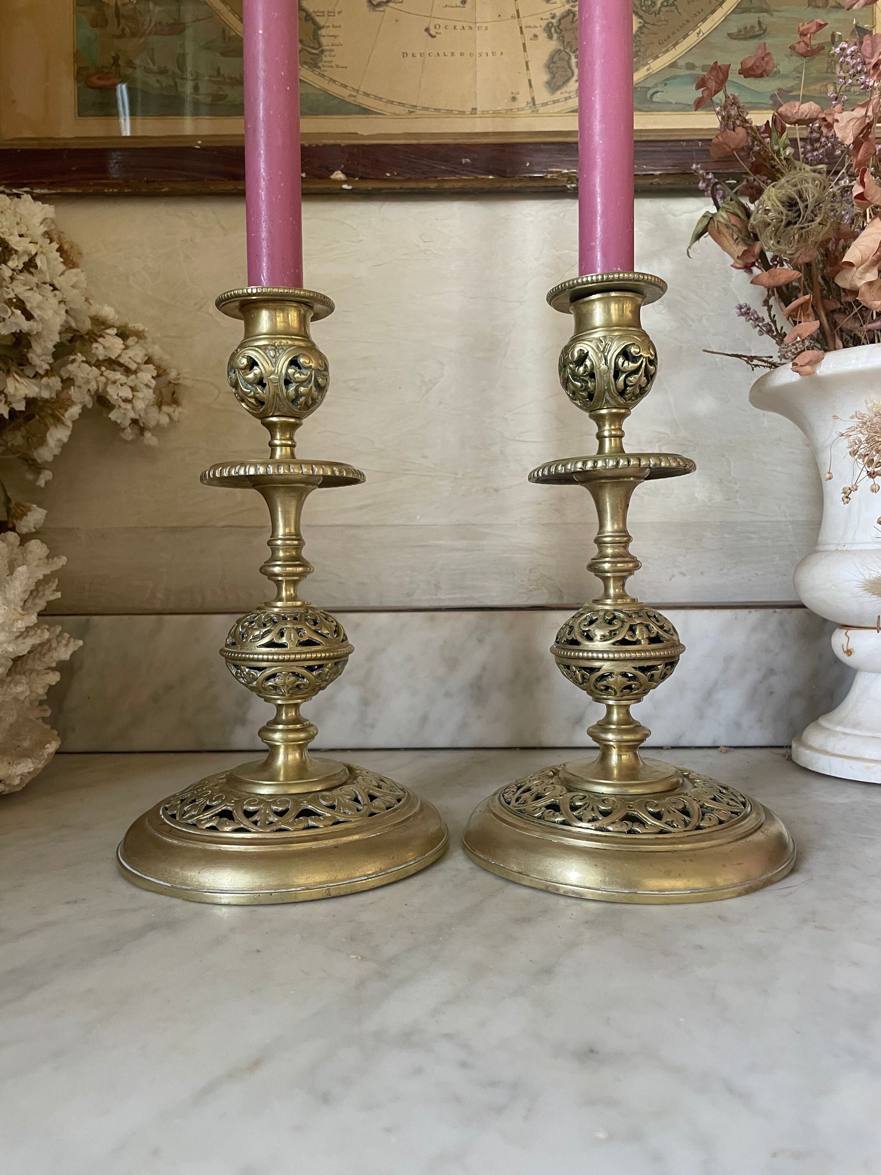 pair of openwork gilded brass candlesticks from the 19th century