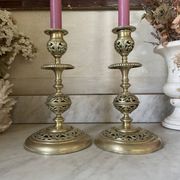 pair of openwork gilded brass candlesticks from the 19th century