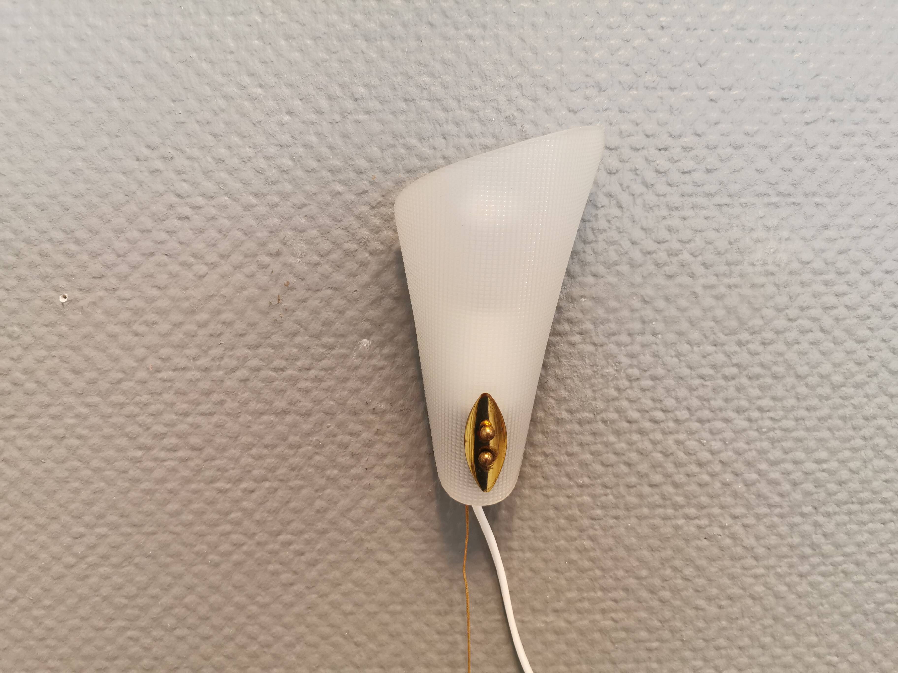 Two small Art Deco wall lights.